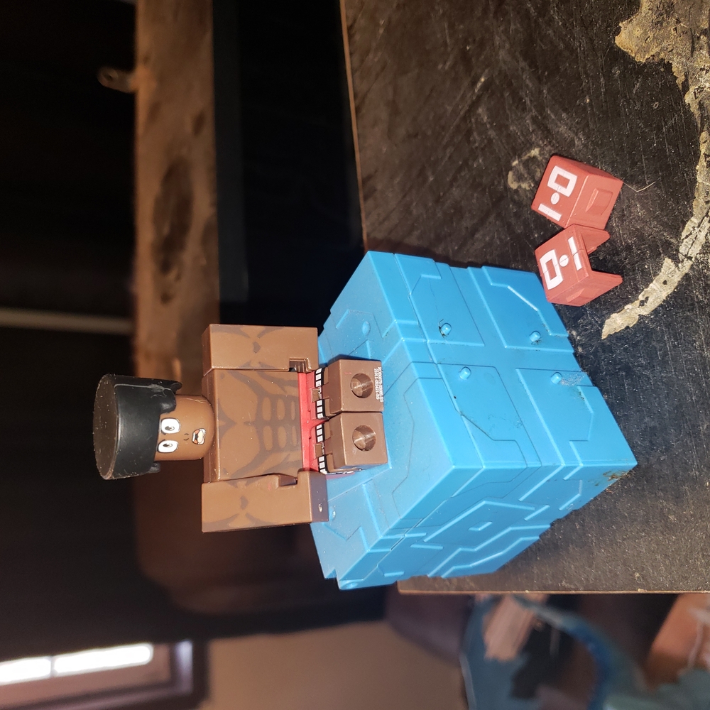 Blue and Brown Action Figure with Accessories